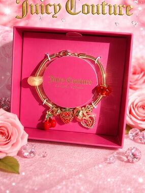 Juicy Couture Gold Charm Bracelet with Red and Pink Accents